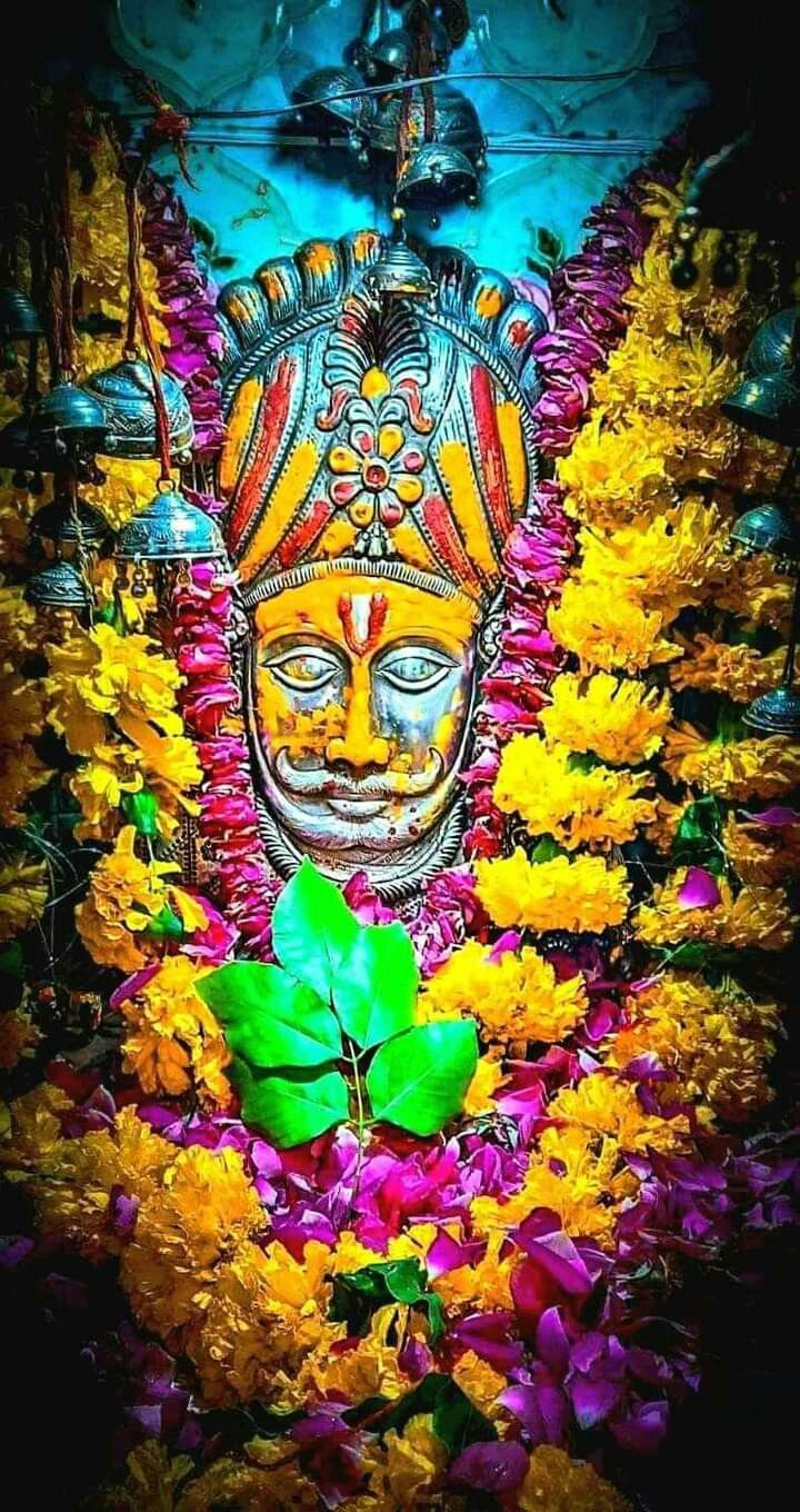 Ramdevpir face with floral decorations