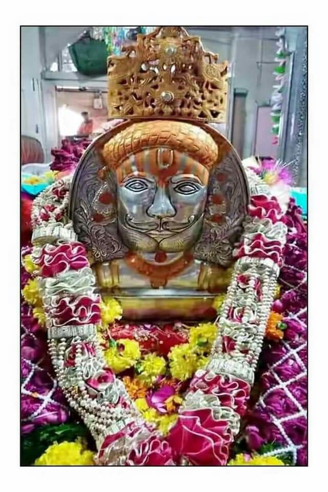 Close-up of Baba Ramdevpir\'s face.