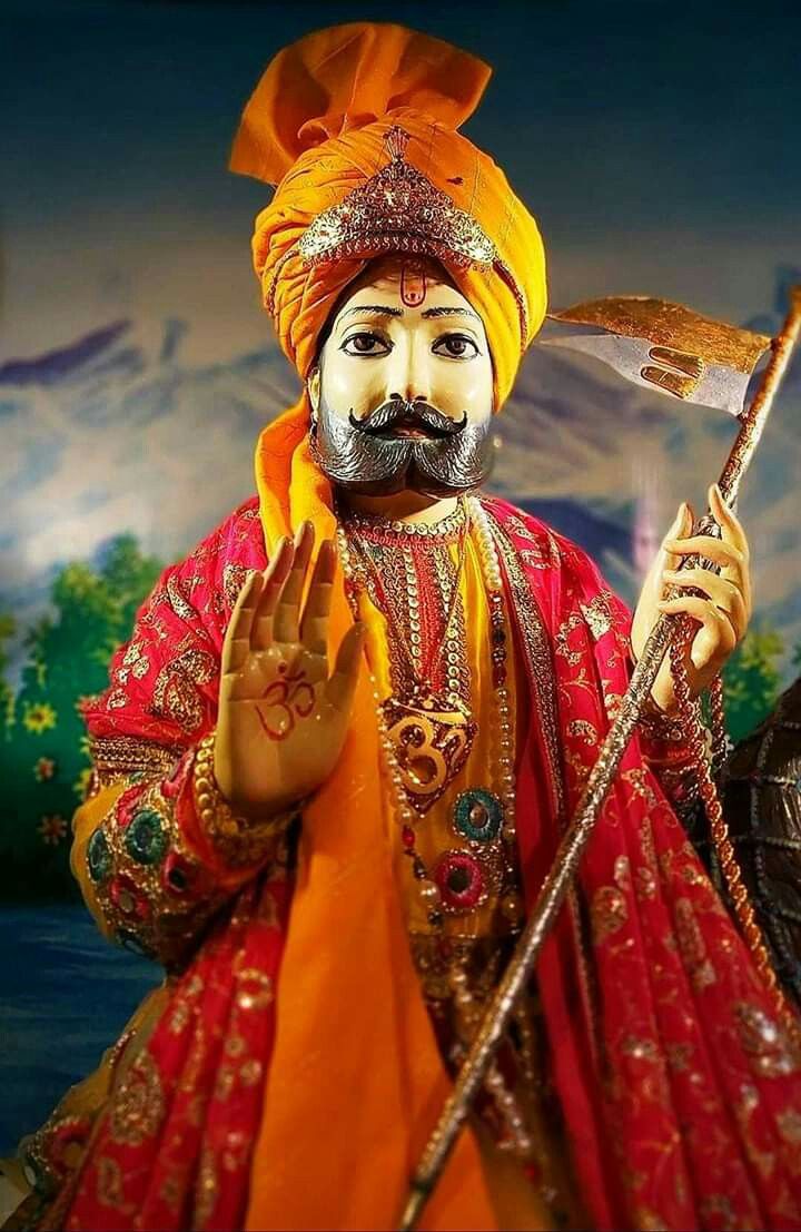 Baba Ramdevpir with raised hand blessing