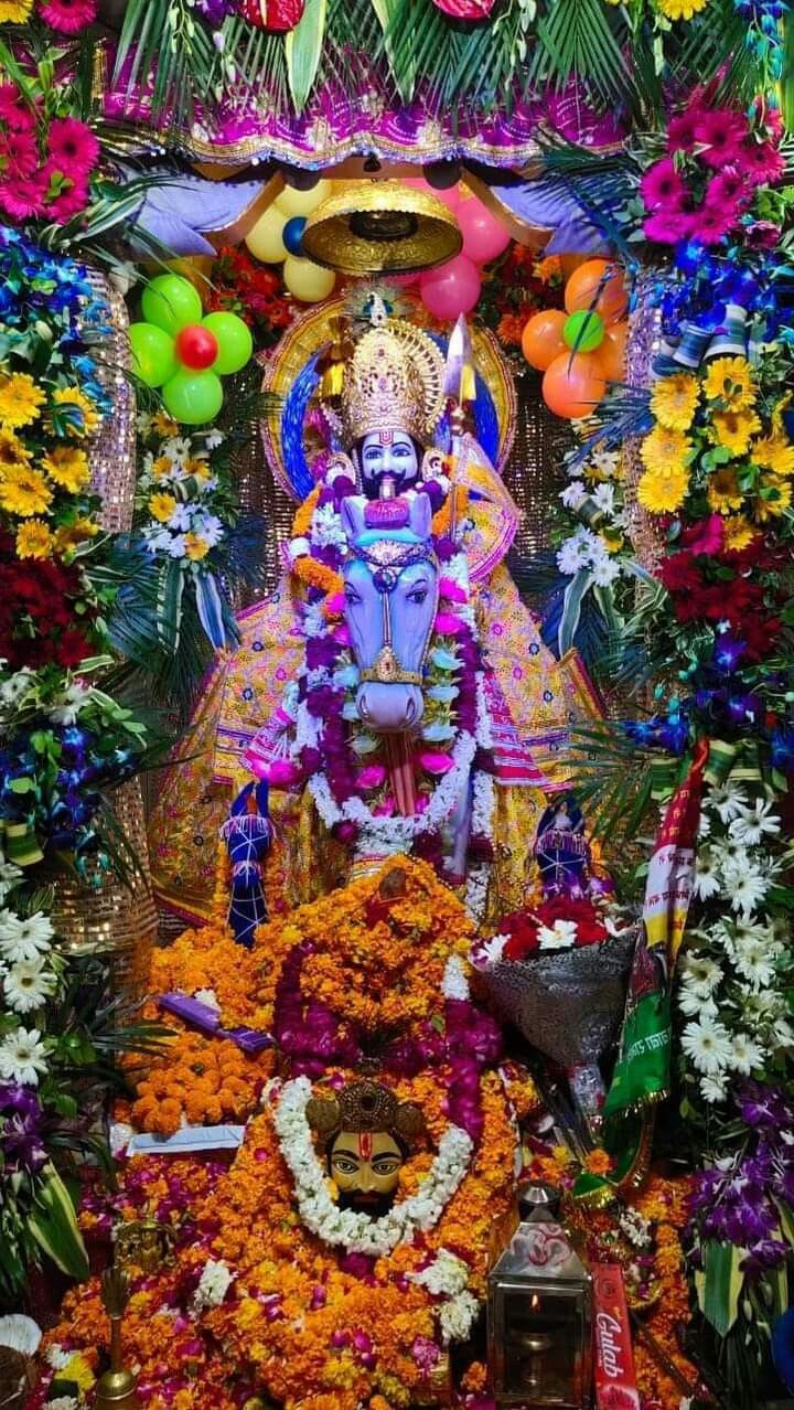 Ramdevpir with horse amidst flowers