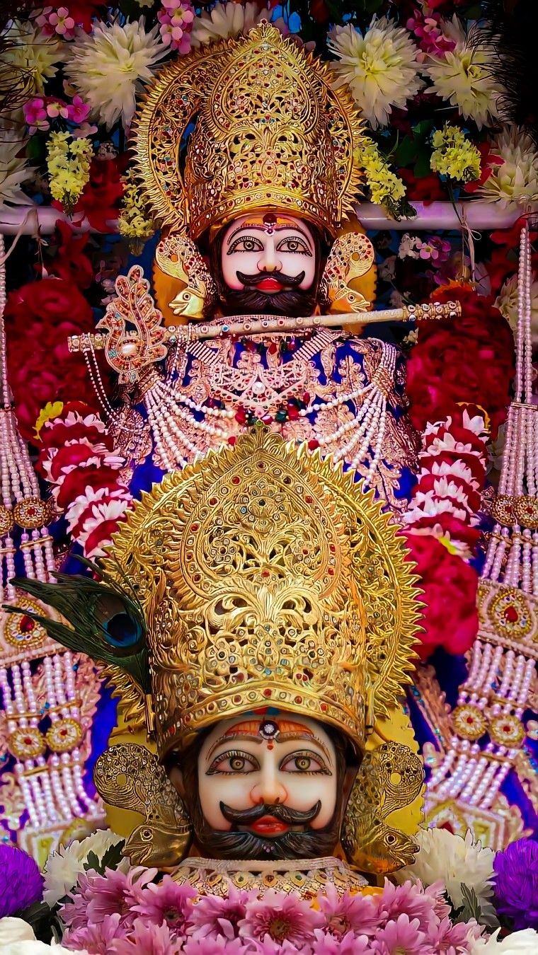 Ramdevpir adorned with vibrant flowers