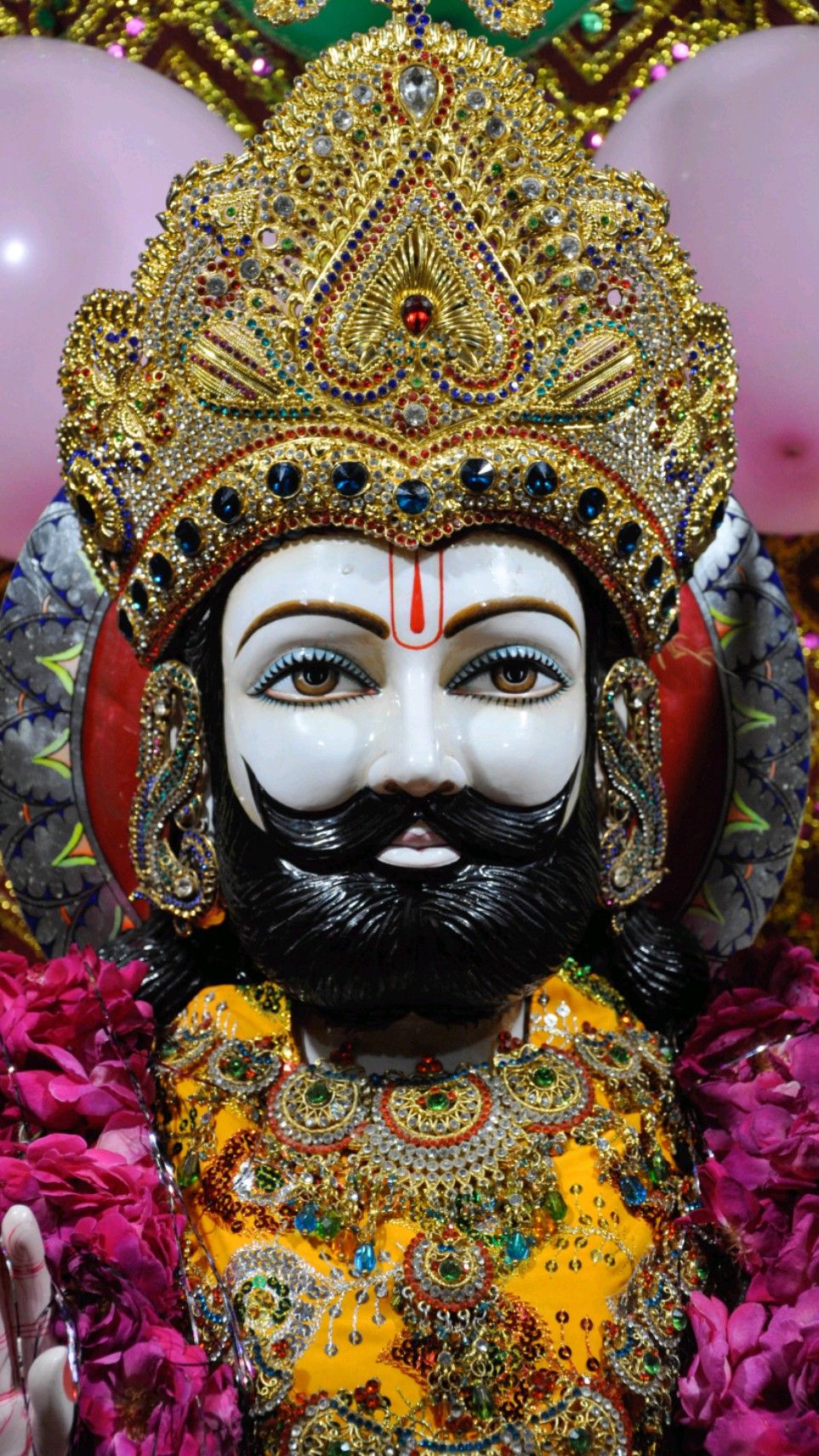 Close-up of Ramdevpir with jeweled crown
