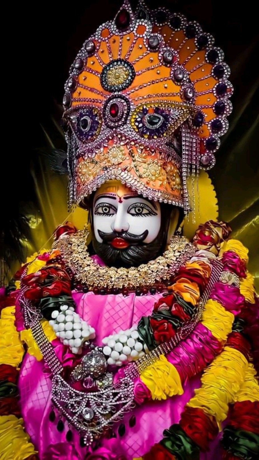 Baba Ramdevpir with ornate headgear.