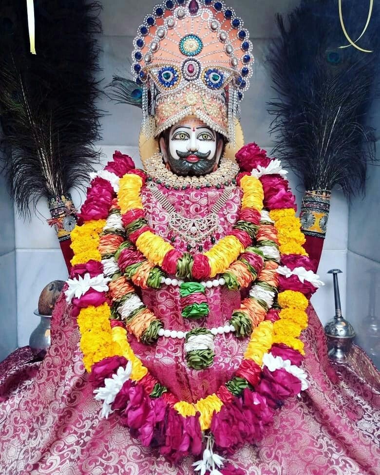 Ramdevpir with floral decorations divine image