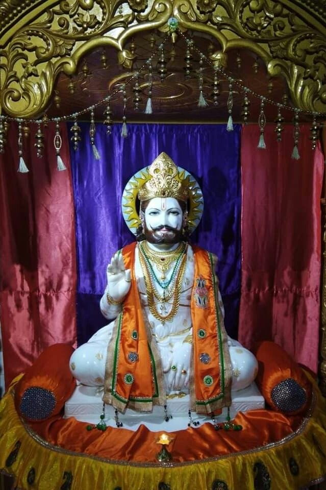 Ramdevpir statue in temple setting