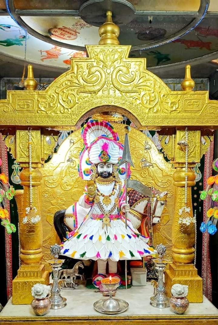 Ramdevpir deity in ornate temple setting