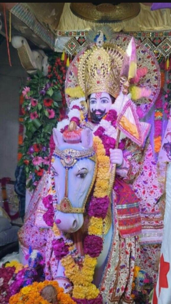 Ramdevpir on a white horse