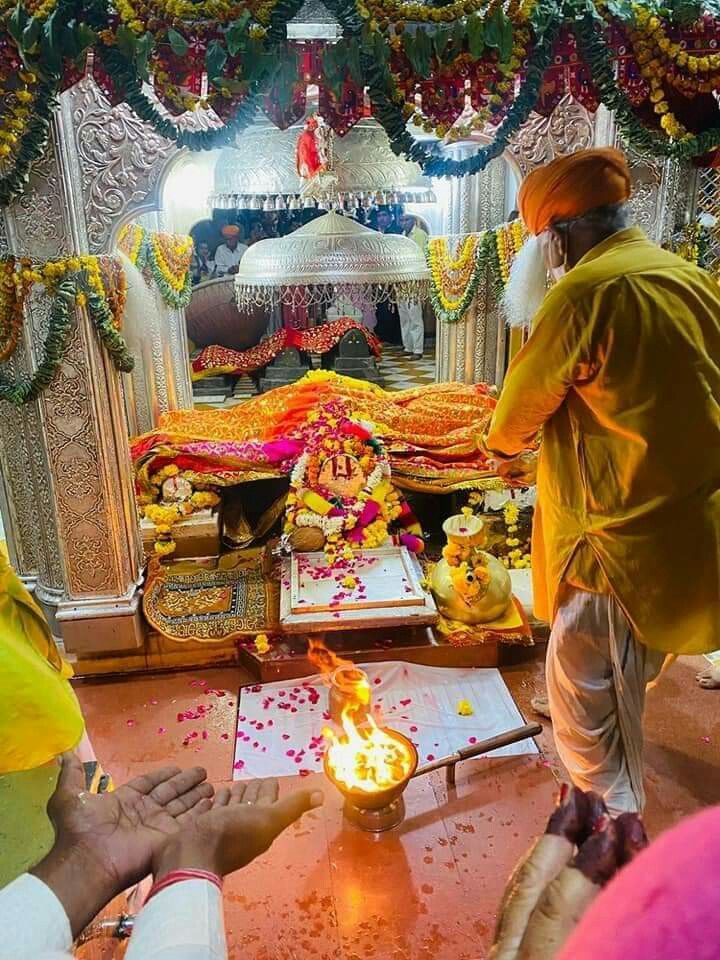 Ramdevpir altar with sacred flame.