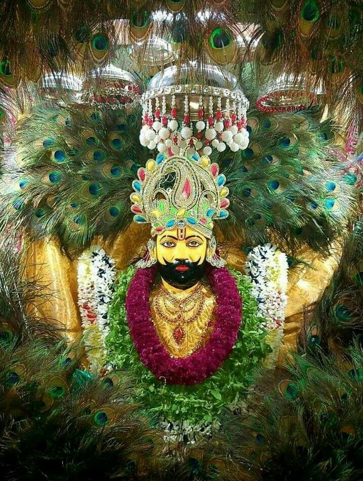 Ramdevpir with floral decorations and gold