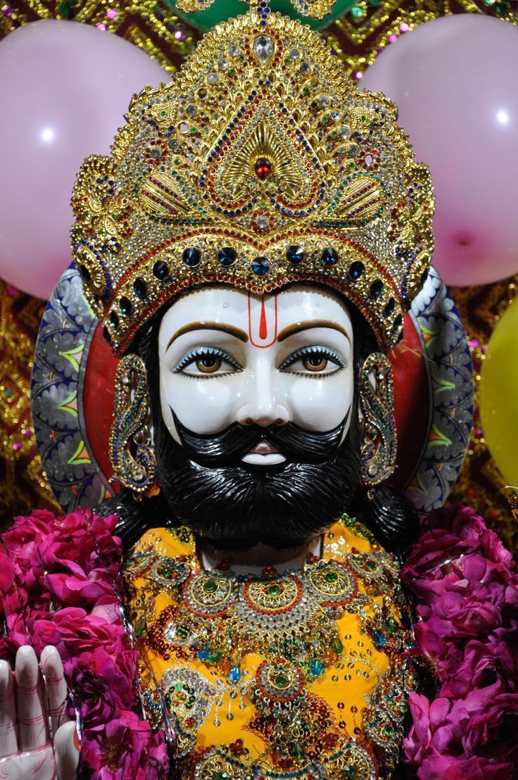Close-up of Ramdevpir\'s serene face.