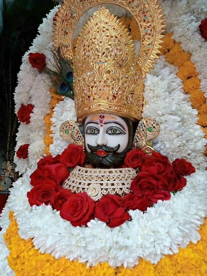 Ramdevpir with floral decorations close-up