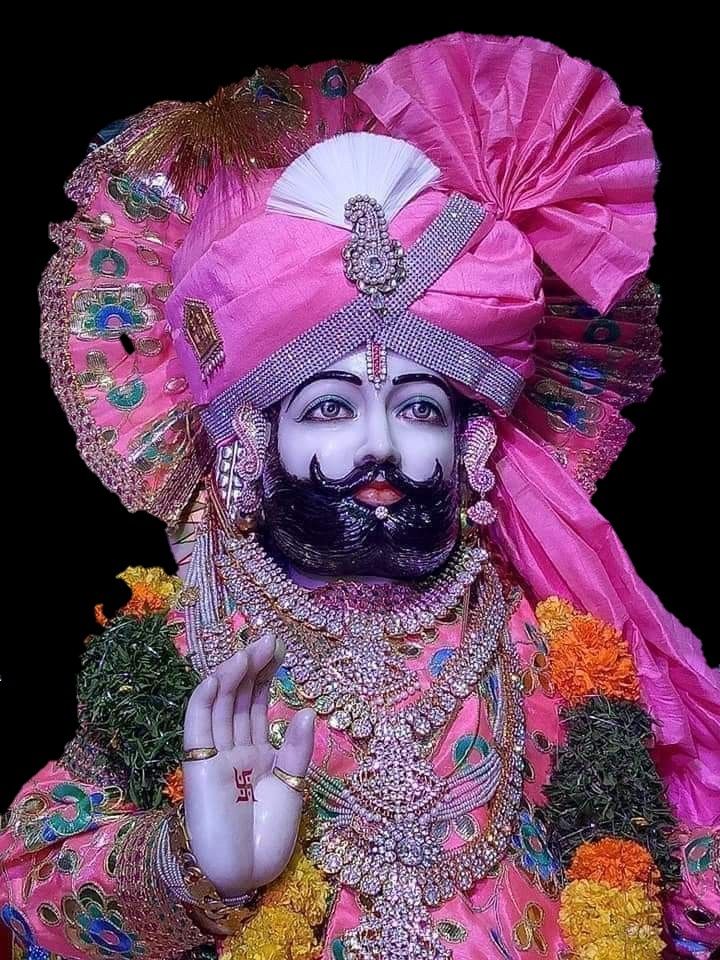 Ramdevpir portrait with ornate turban.