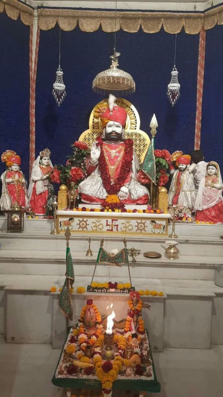 Ramdevpir seated on a throne