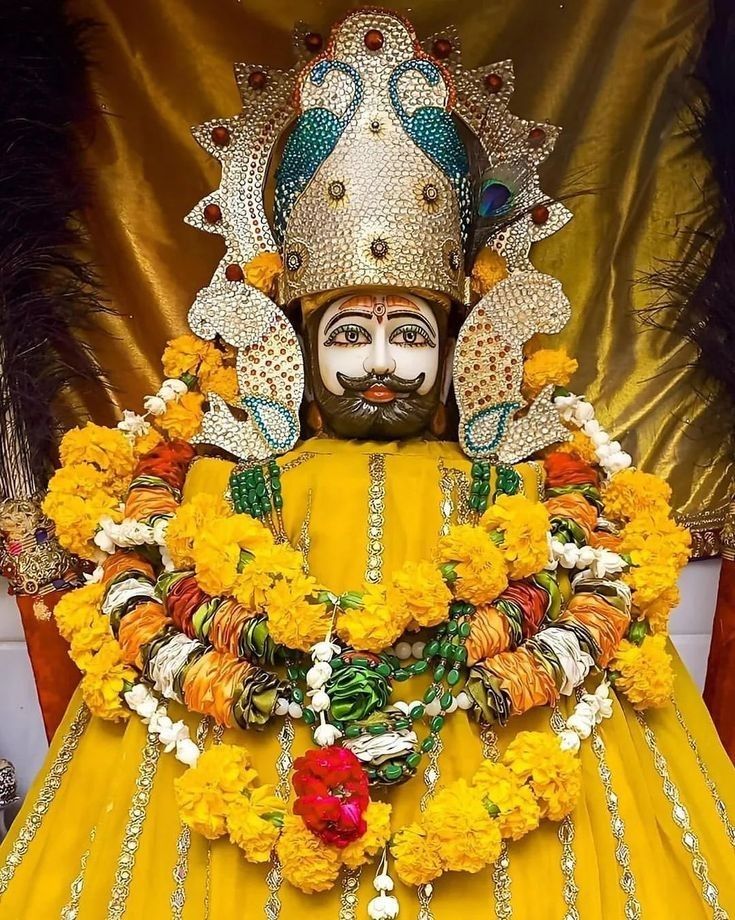 Ramdevpir with floral garland and crown