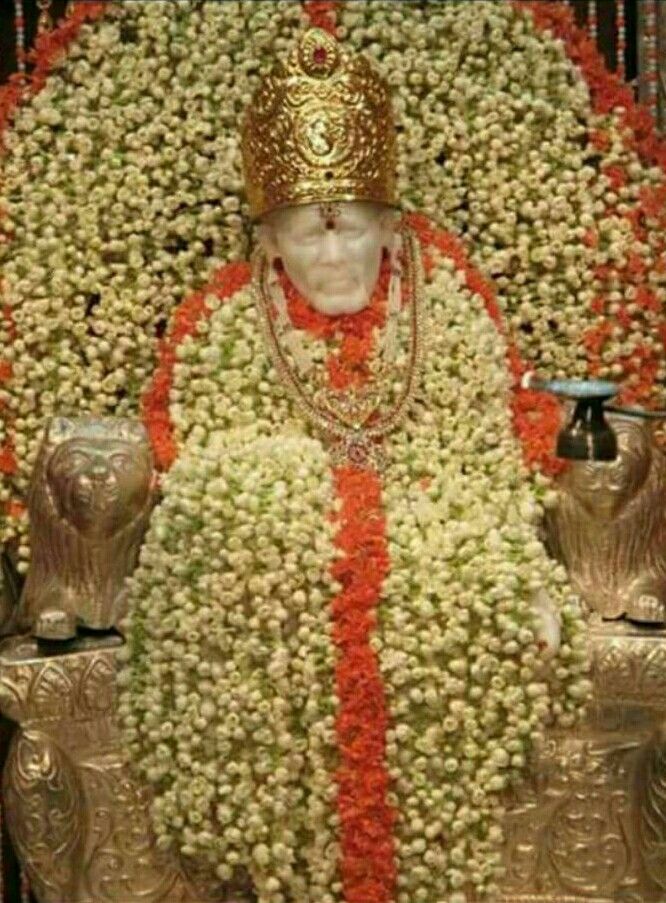 Sai Baba adorned with beautiful flowers