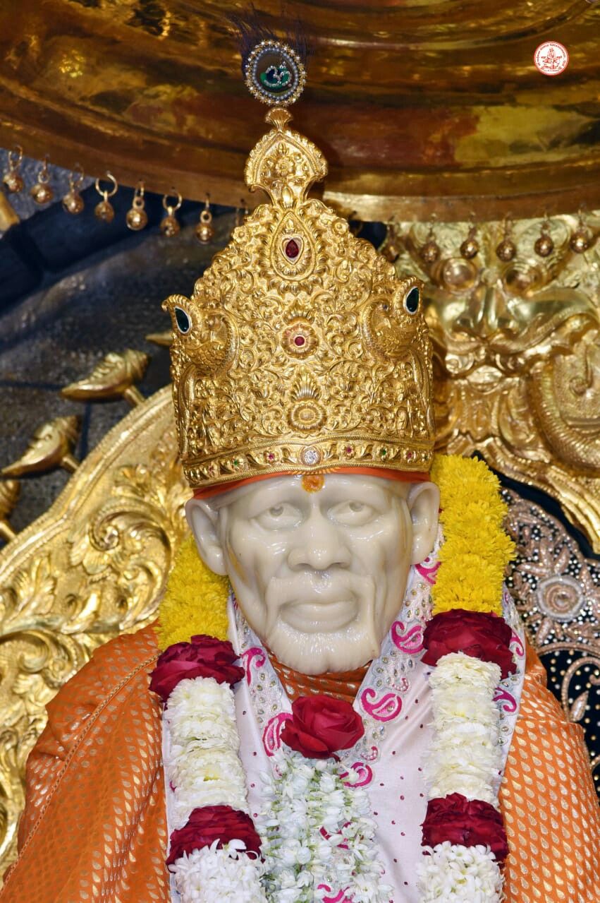 Sai Baba with golden crown, serene face