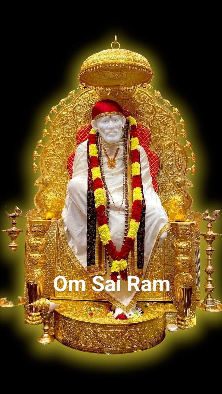 Sai Baba seated on golden throne
