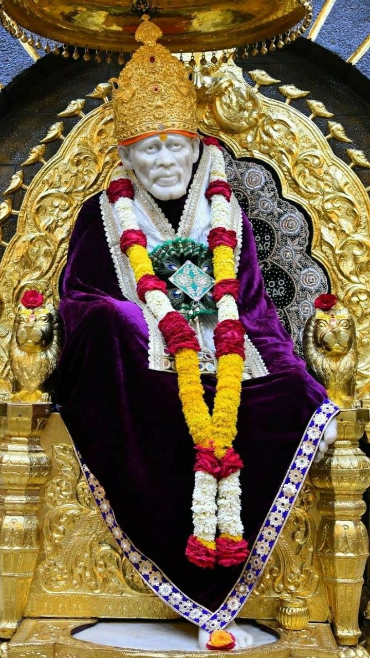 Sai Baba on golden throne