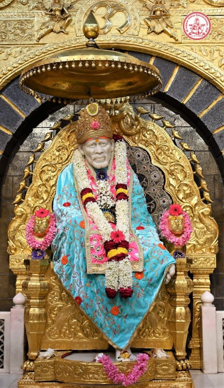 Sai Baba on golden throne