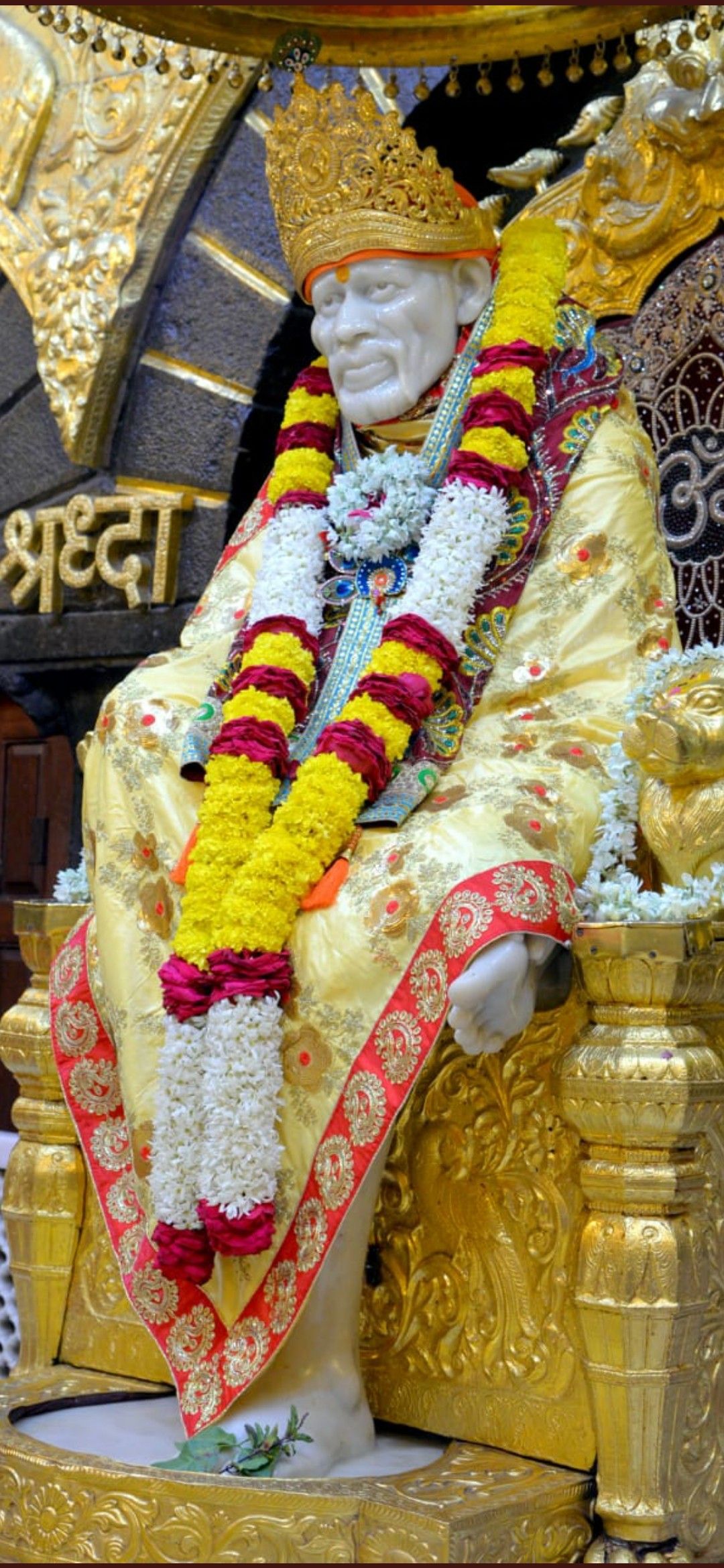 Sai Baba Shirdi idol with flowers