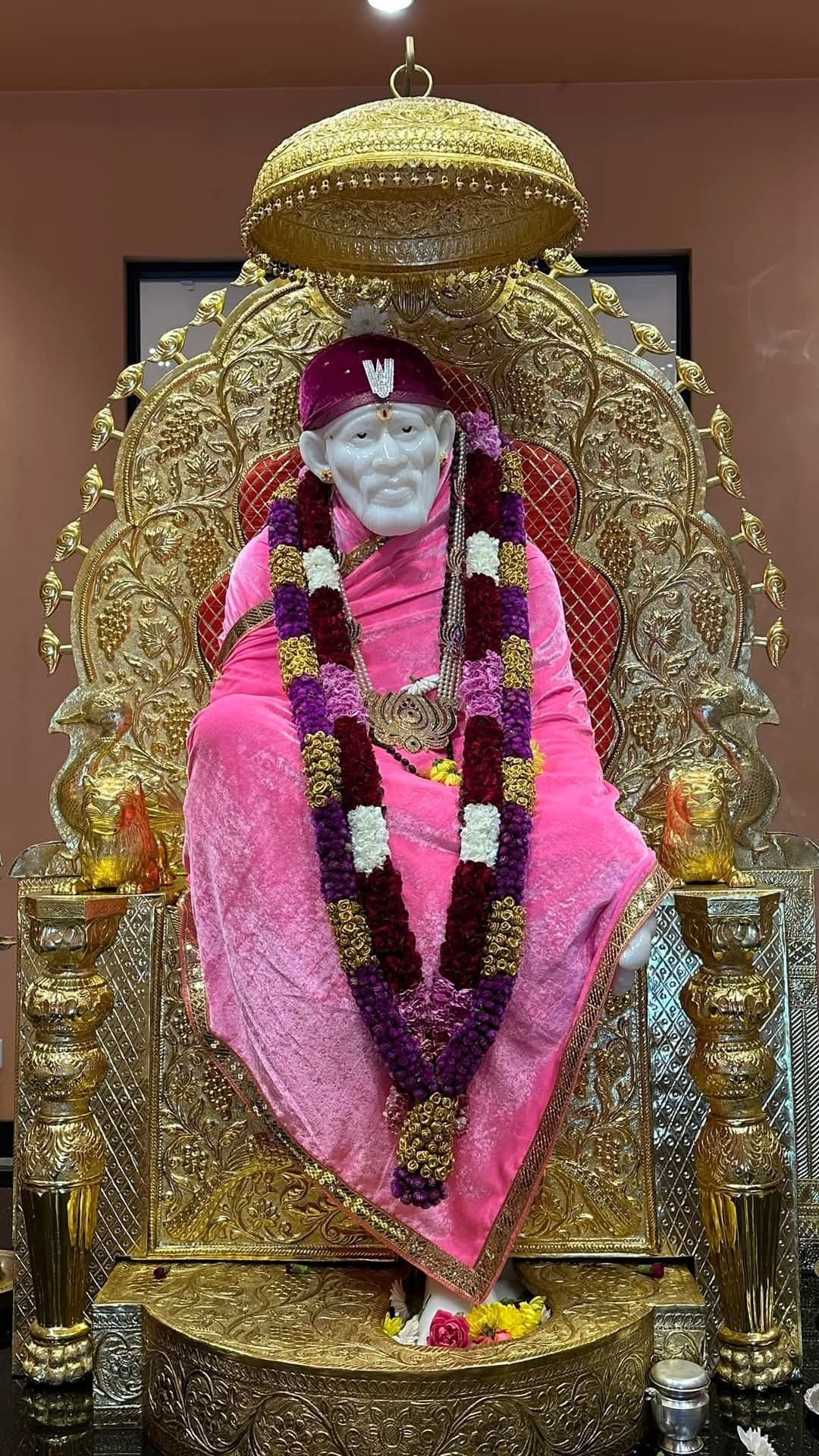 Sai Baba idol on golden throne