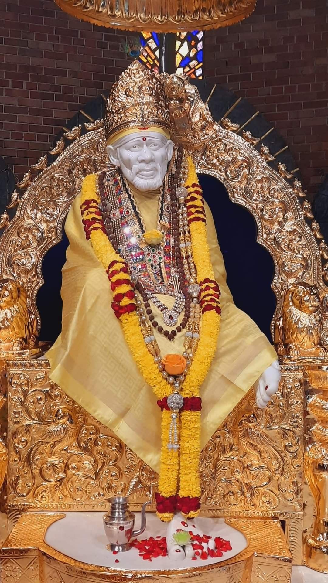 Sai Baba idol on golden throne
