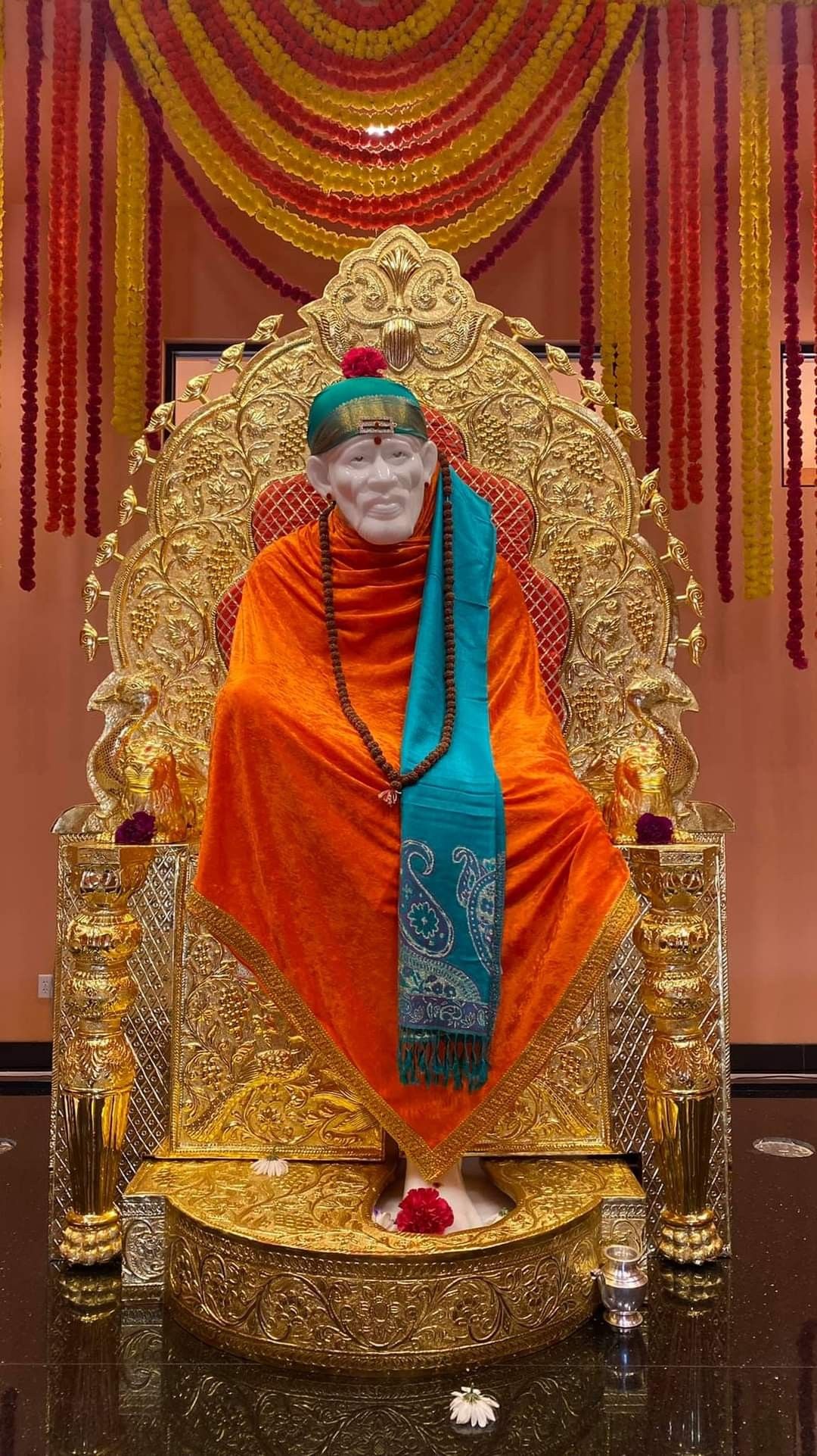 Shirdi Sai Baba on golden throne