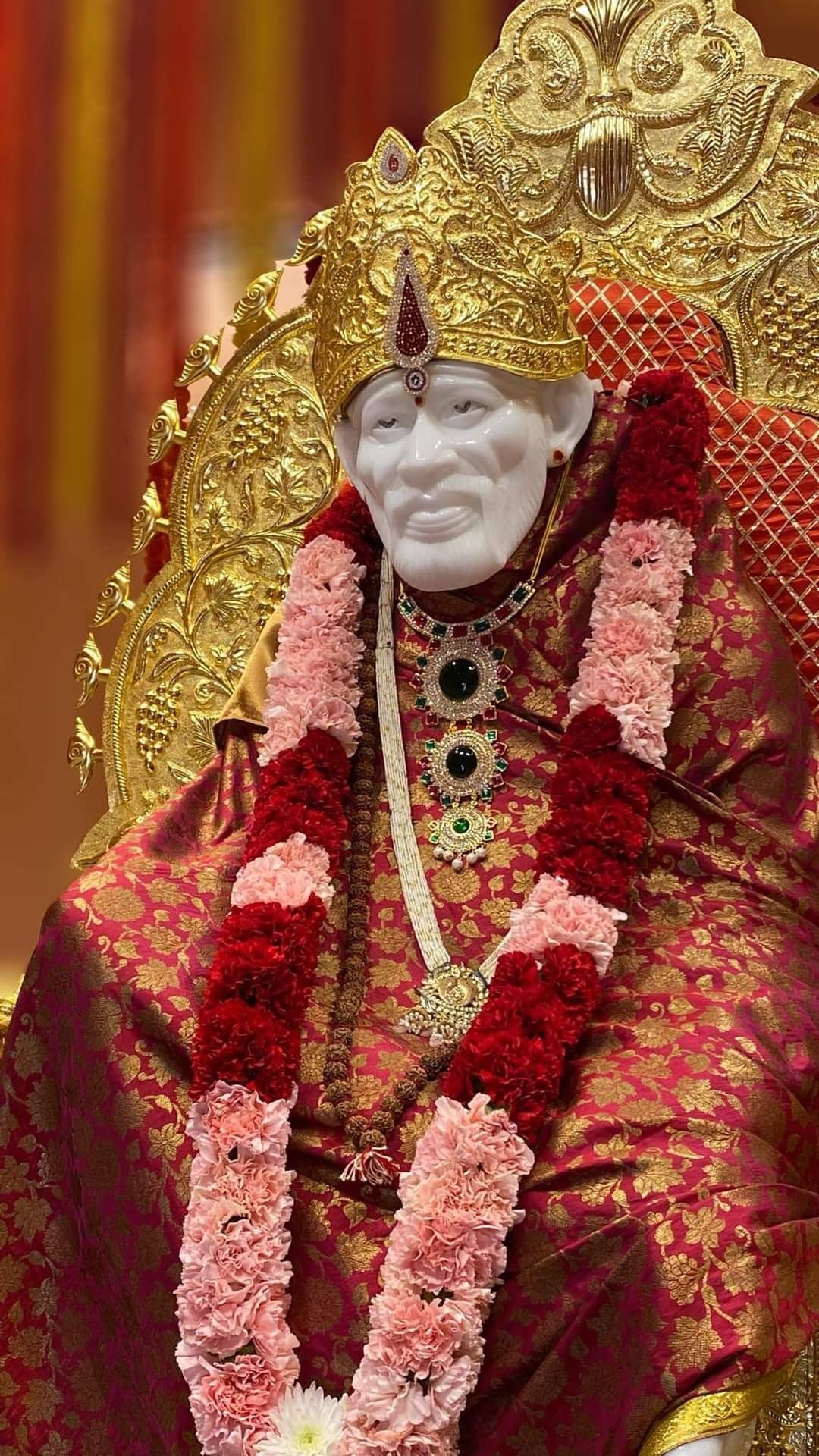 Sai Baba idol on golden throne