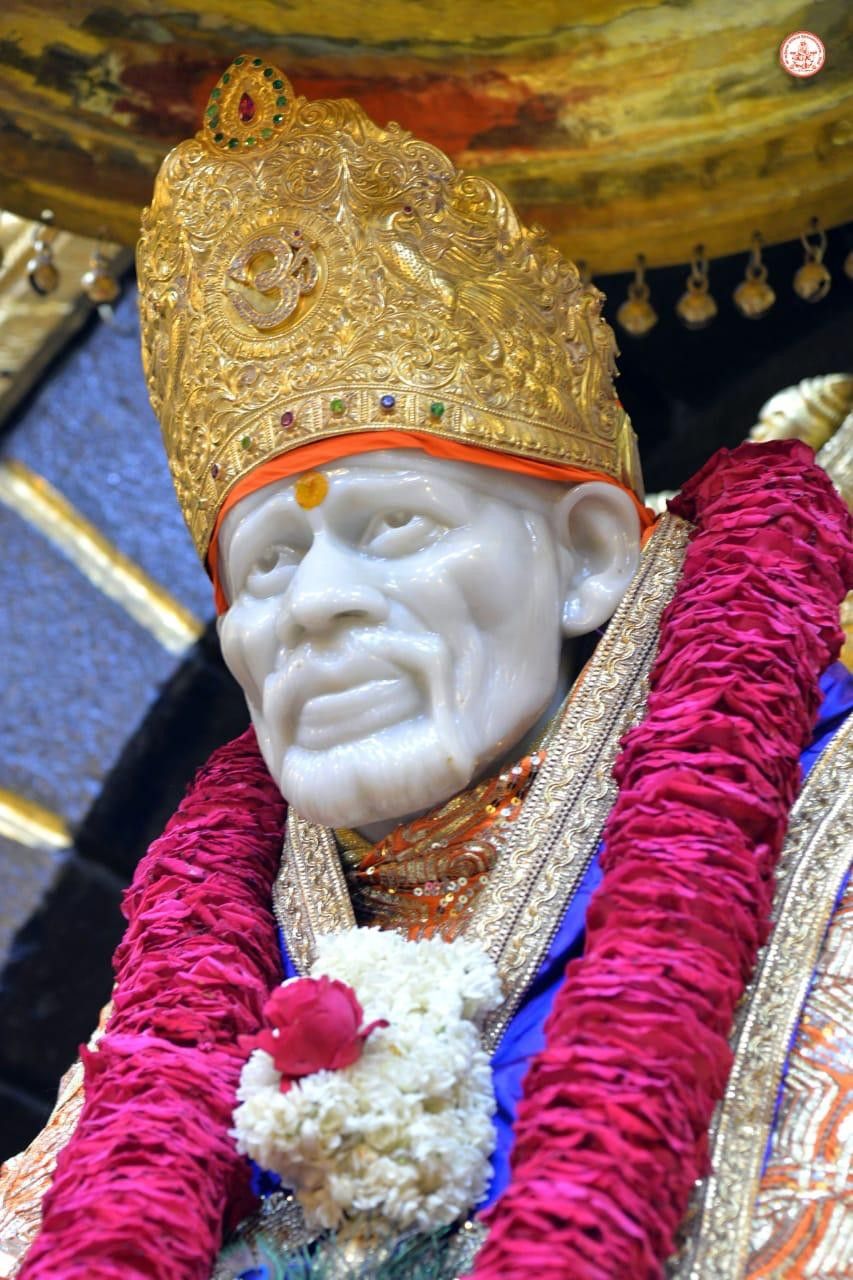 Sai Baba with golden crown
