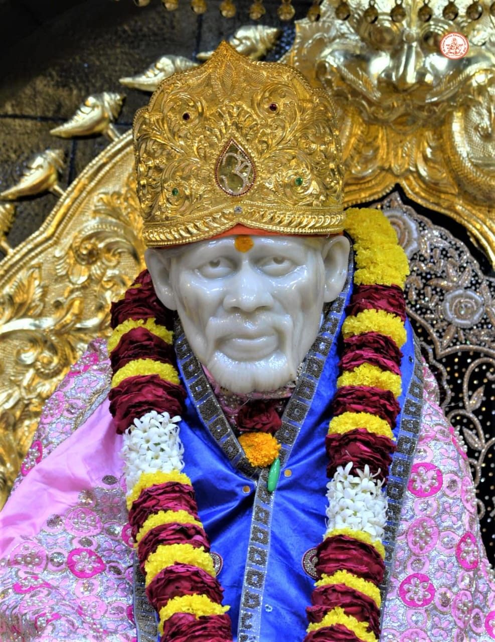 Sai Baba statue with golden crown