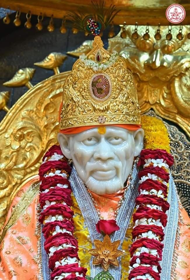 Sai Baba idol with gold headgear
