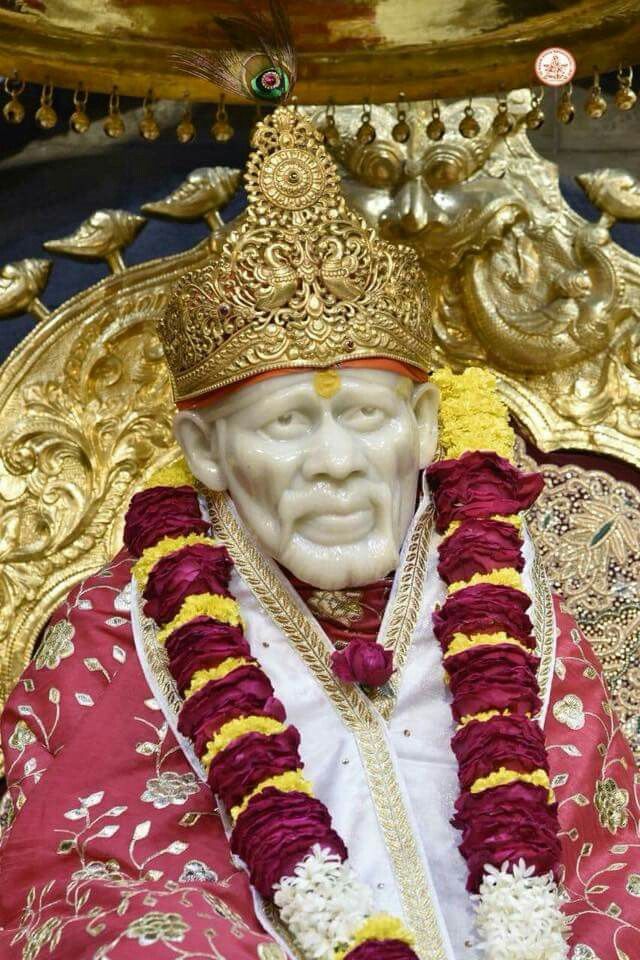Sai Baba with golden crown, blissful face