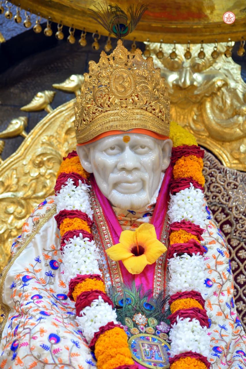 Sai Baba with golden crown