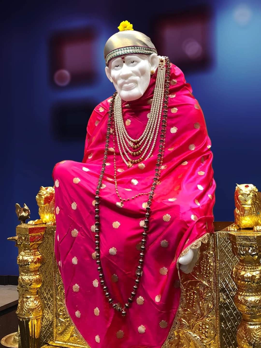 Shirdi Sai Baba statue in pink robes
