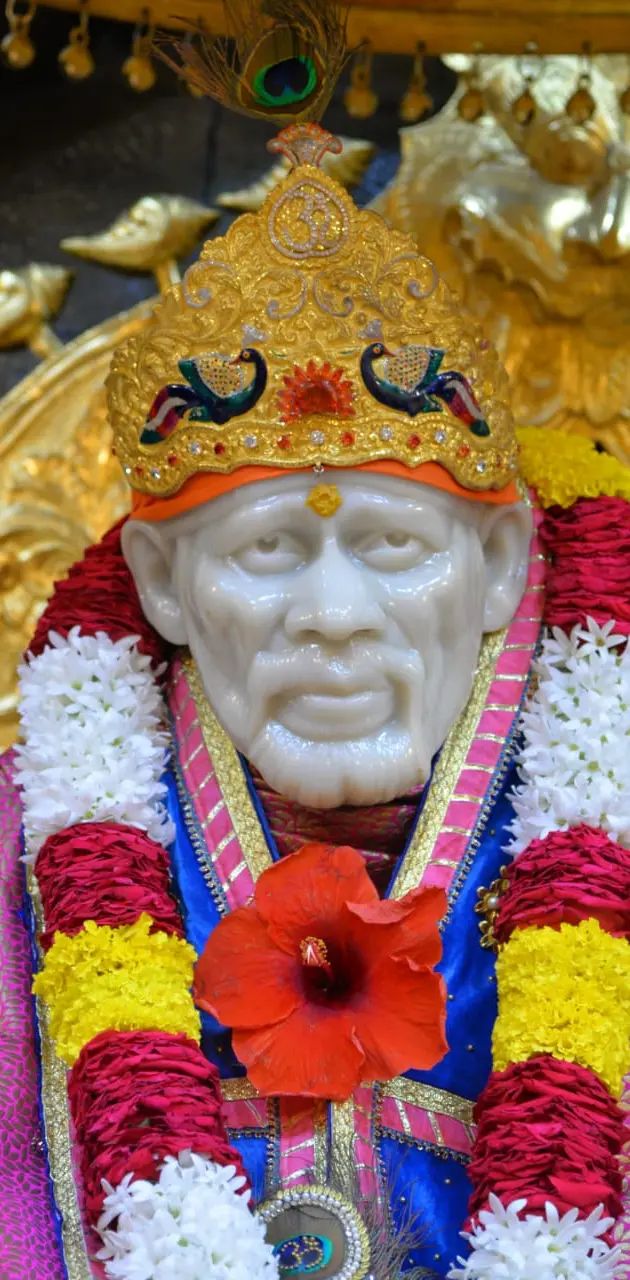 Sai Baba with golden crown