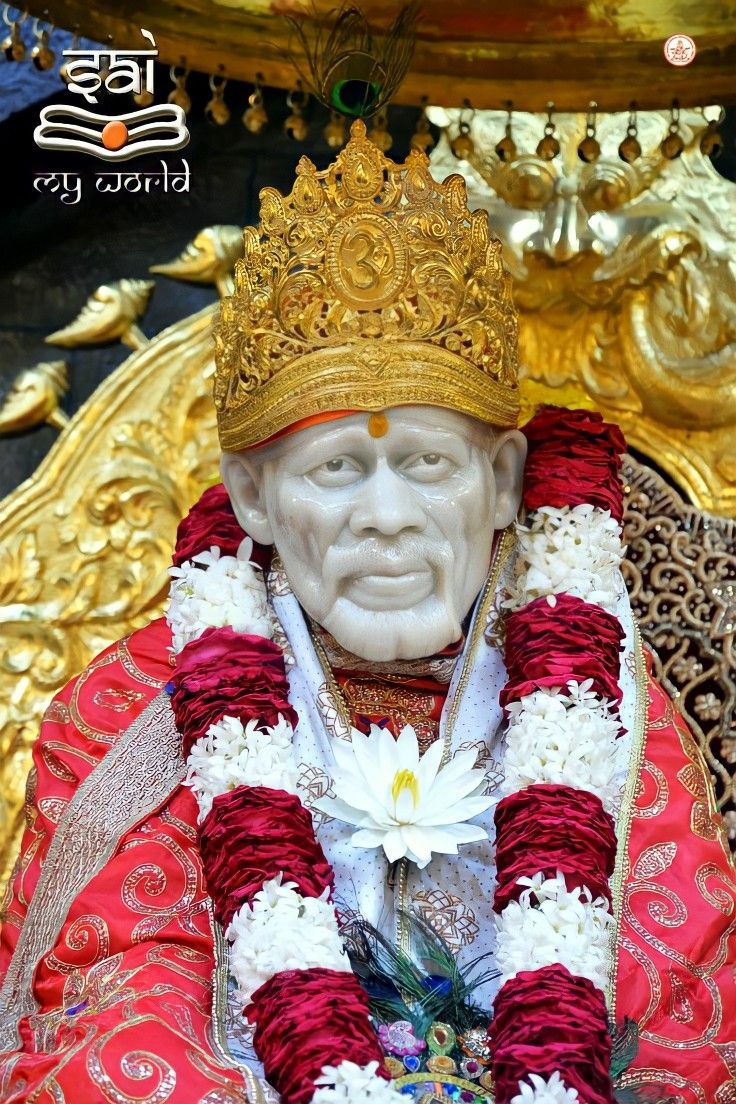 Sai Baba adorned with flowers