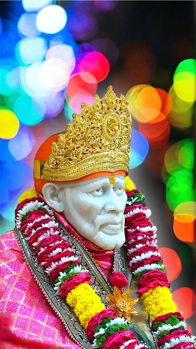 Sai Baba with golden crown and lights