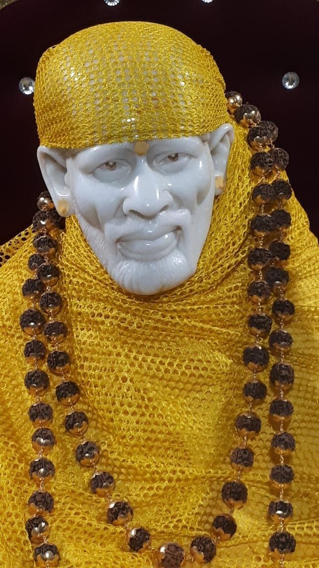 Close up of Sai Baba statue.