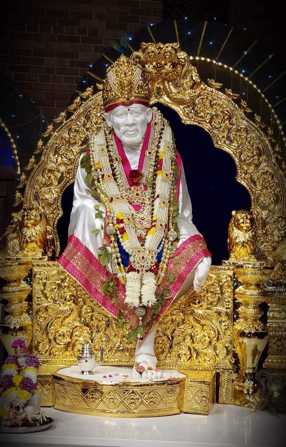 Sai Baba idol in golden splendor