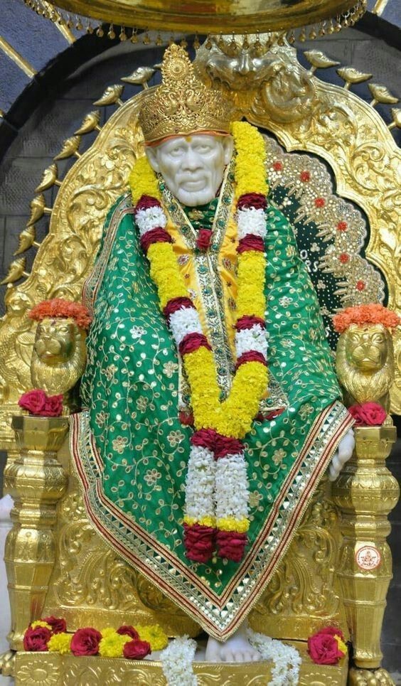 Sai Baba on golden throne