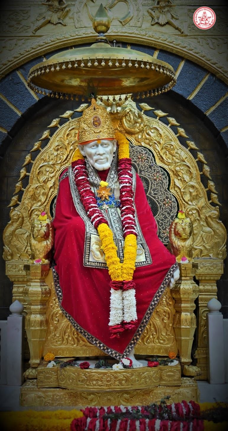 Sai Baba on golden throne