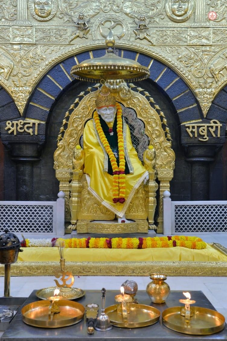 Sai Baba seated in Shirdi temple