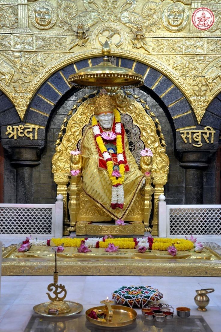 Sai Baba seated in Shirdi temple
