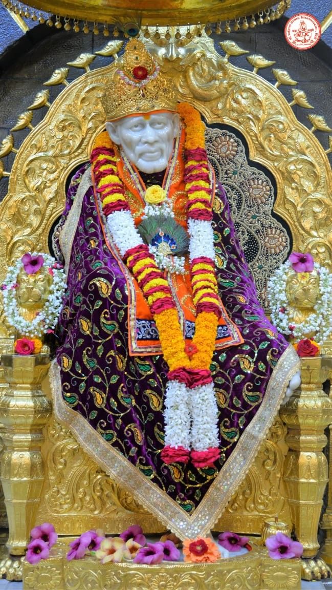 Sai Baba adorned in flowers, Shirdi