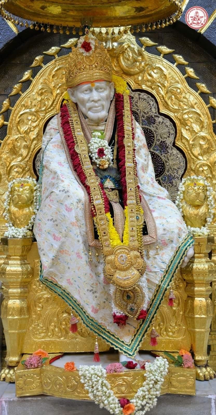 Shirdi Sai Baba adorned with flowers