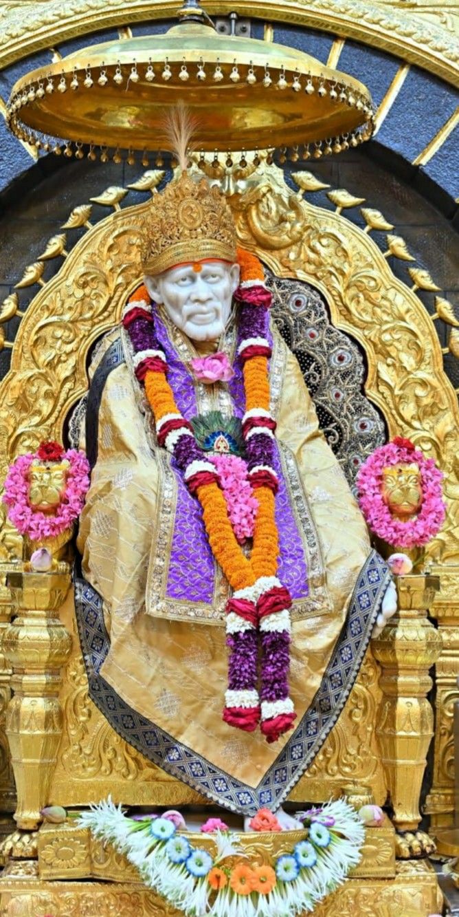 Sai Baba seated in Shirdi temple