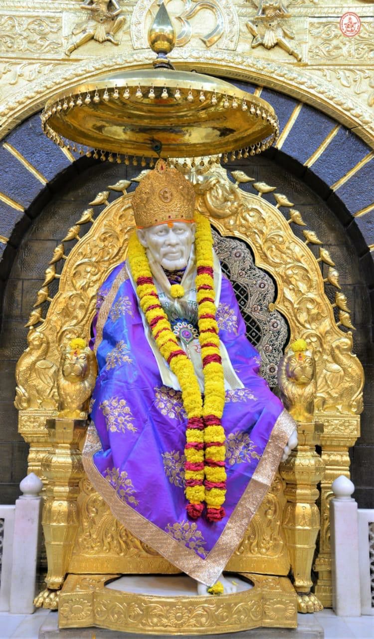 Sai Baba on golden throne