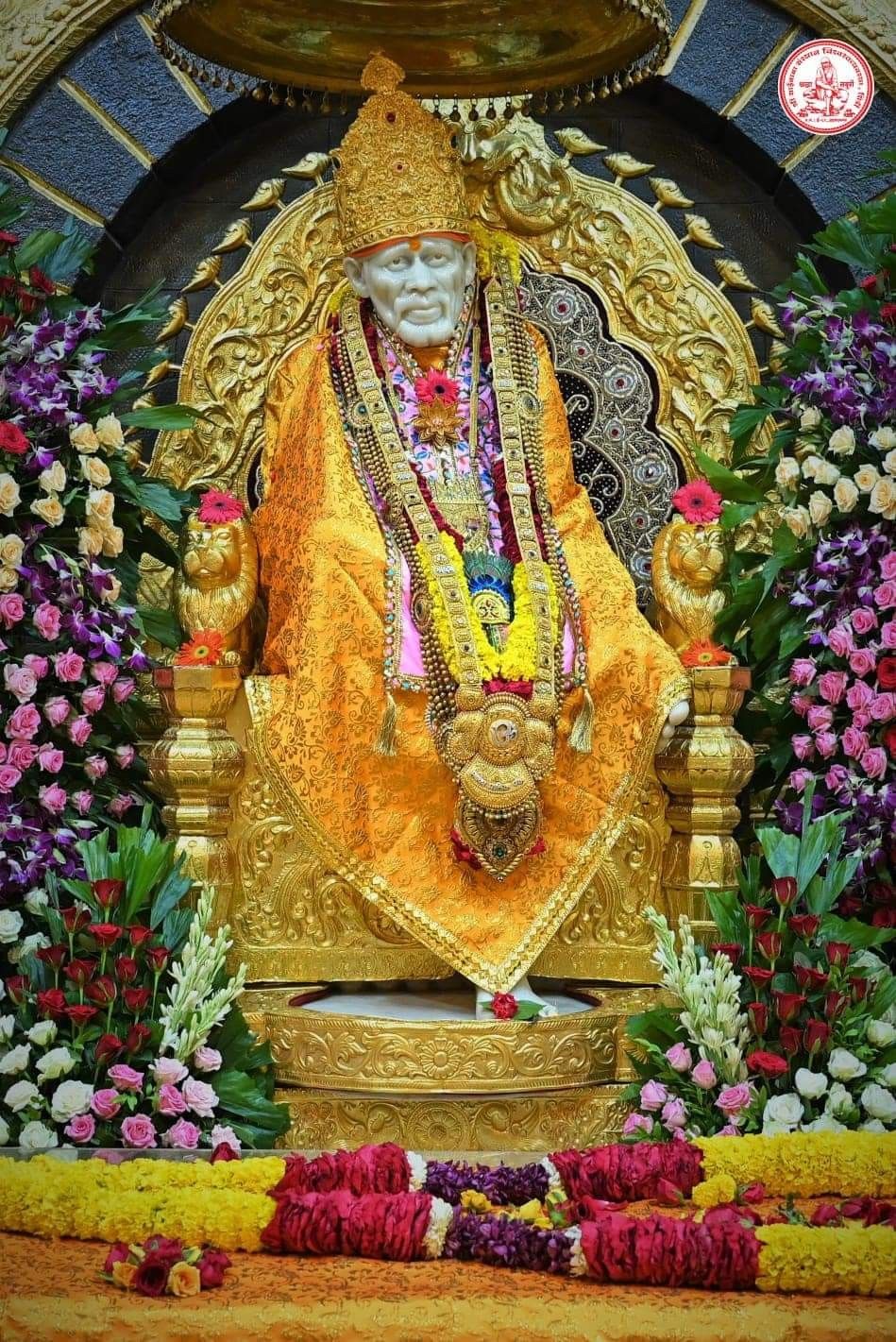 Sai Baba adorned with beautiful flowers.