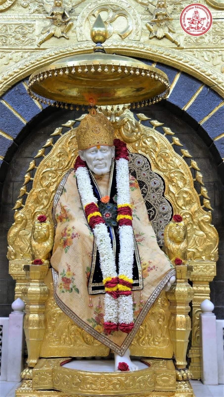 Sai Baba in golden chair portrait