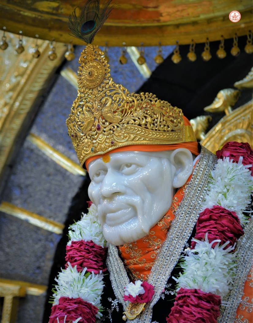 Sai Baba idol with golden crown